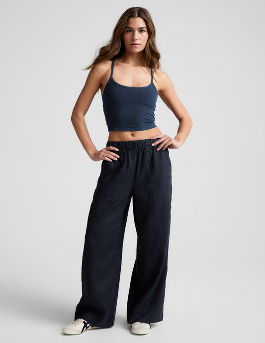 Model wearing navy SoftWash Linen Easy Wide Leg Pant 29" with a gathered elastic waistband and slant pockets.