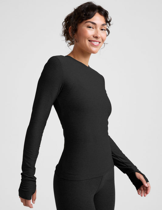 black crew neck long sleeve with thumb holes.