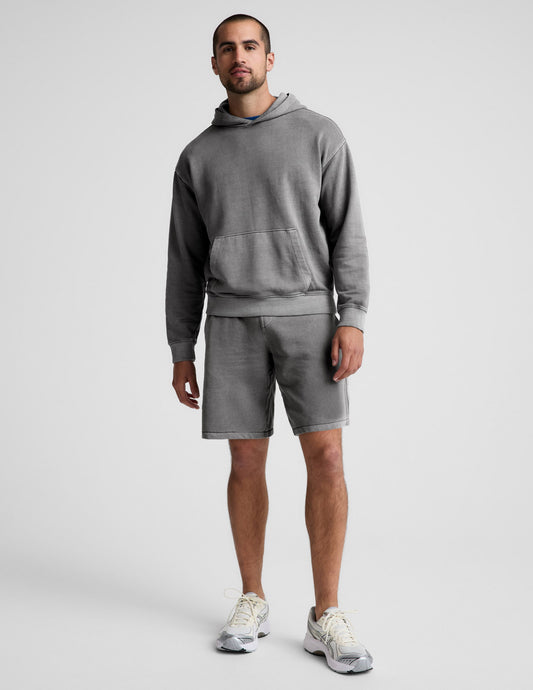Man wearing Gray Beach Washed Terry Men's Short™ paired with a matching gray hoodie and white sneakers.
