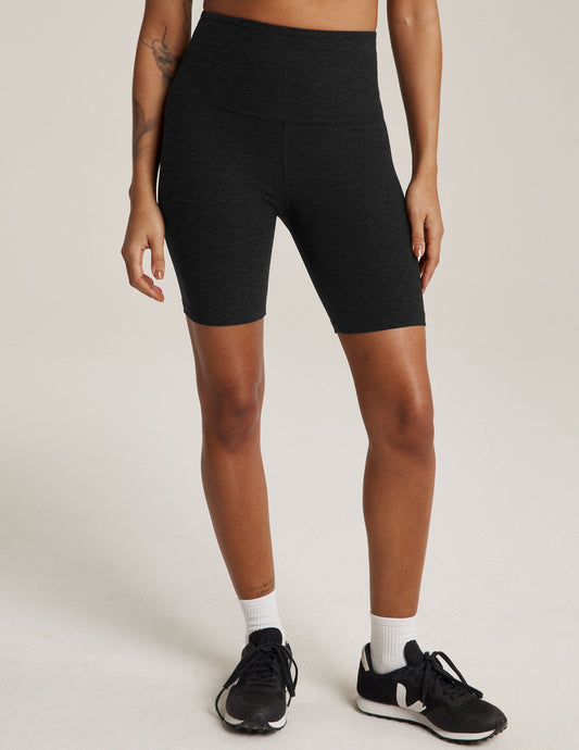 Spacedye High Waisted 7" Biker Short in black marled fabric, worn on model with a high-rise fit and mid-thigh length.