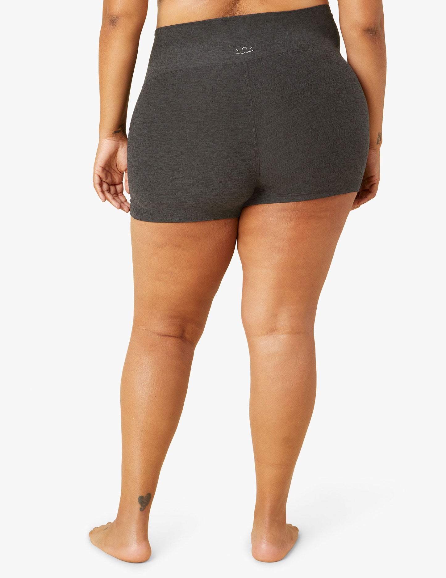 Rear view of Spacedye All For Run 3" Short in marled Darkest Night black, showing the high waistband and snug, short fit.