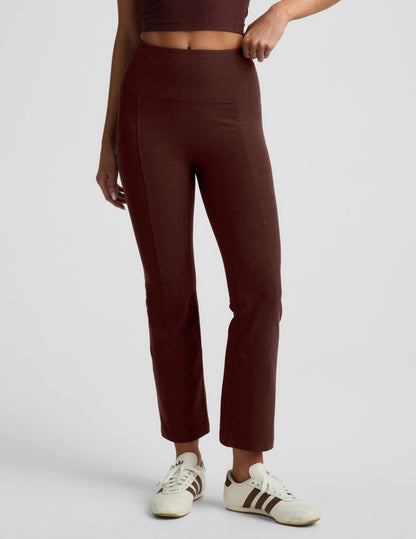 Woman wearing Maroon Spacedye™ Pintuck Kick Flare High Waisted Pant with a matching crop top and cream sneakers.