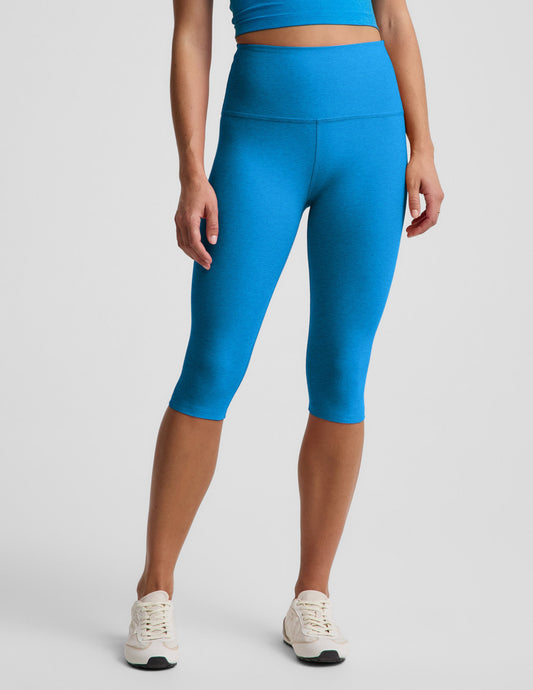 Woman wearing Blue Spacedye™ Pedal Pusher High Waisted Legging with a matching crop top and white sneakers.