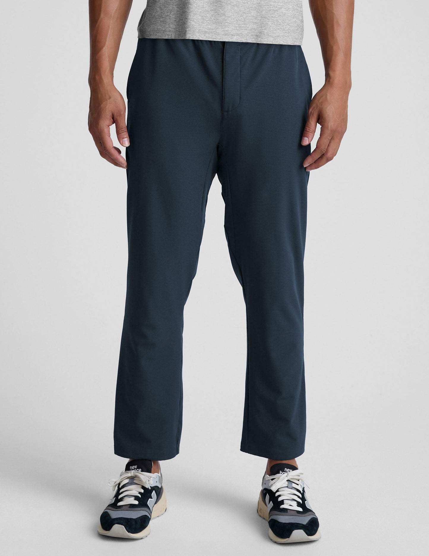 Front view of navy Dynamic Men's Straight Leg Pant featuring a relaxed fit and straight leg silhouette on a model.