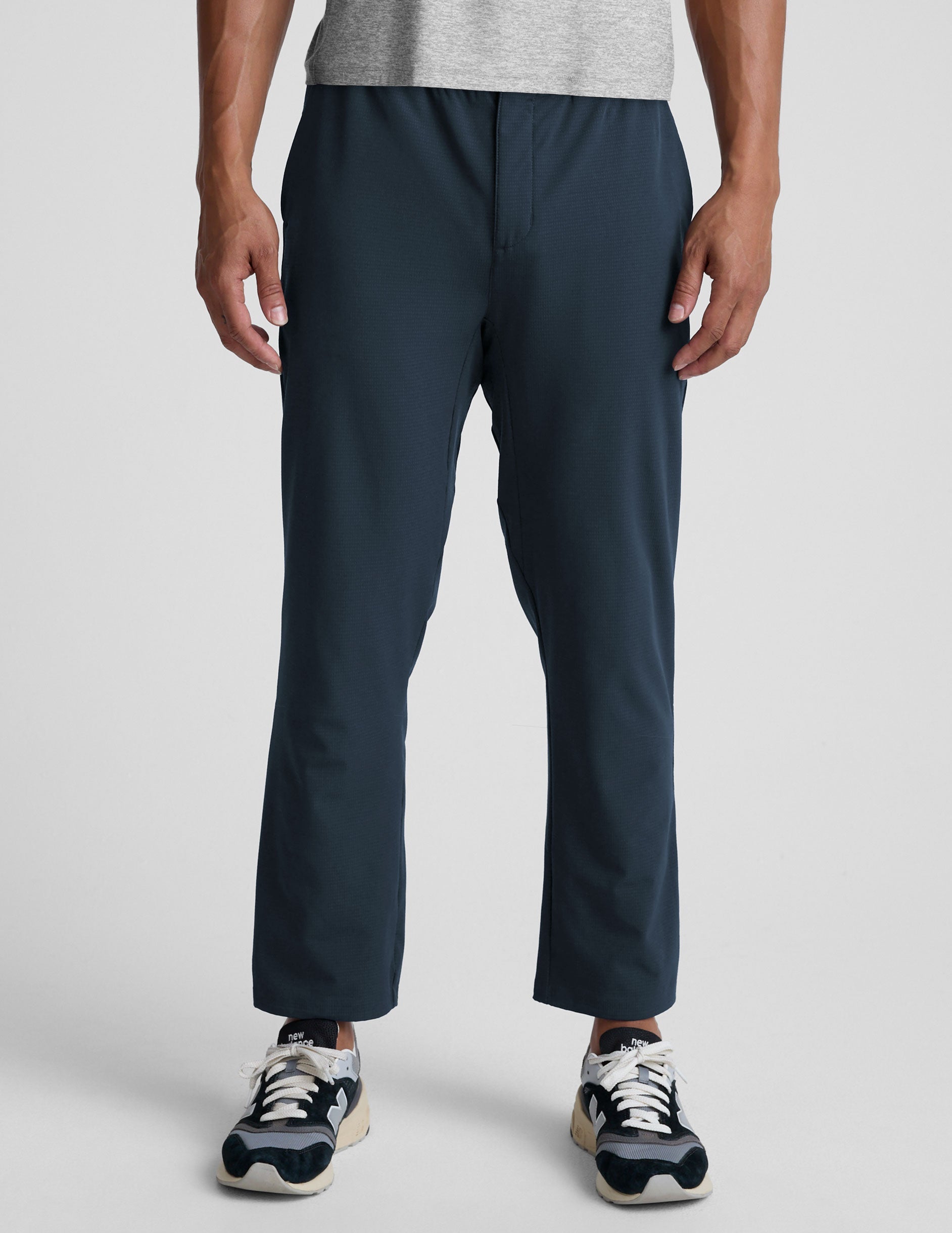 Front view of navy Dynamic Men's Straight Leg Pant featuring a relaxed fit and straight leg silhouette on a model.