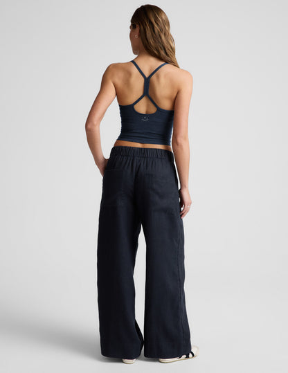 Rear view of navy SoftWash Linen Easy Wide Leg Pant featuring an elastic waistband, back pockets, and a relaxed wide-leg fit.