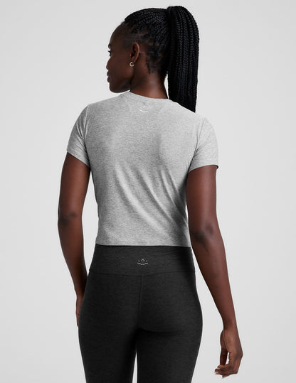 grey short sleeve baby tee.