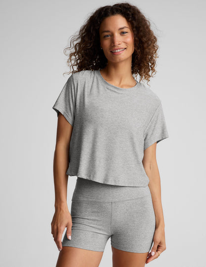 gray short sleeve loose-fitting cropped tee with a scoop neckline.