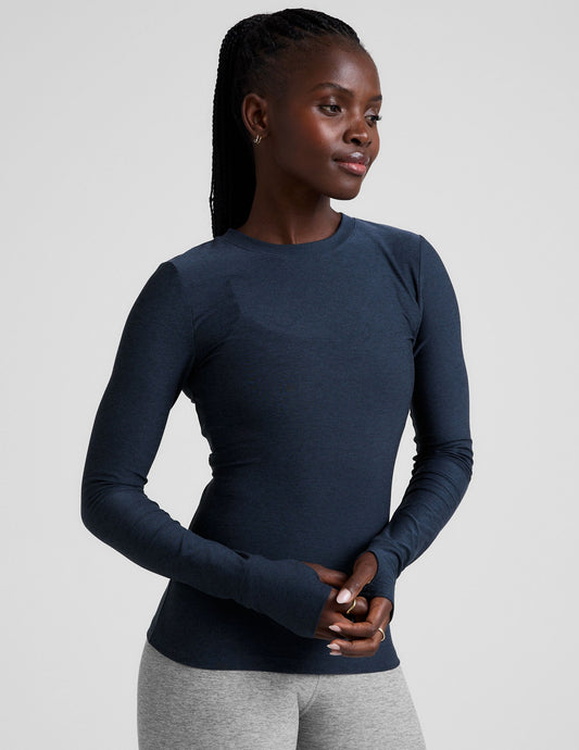 blue crew neck long sleeve with thumb holes.