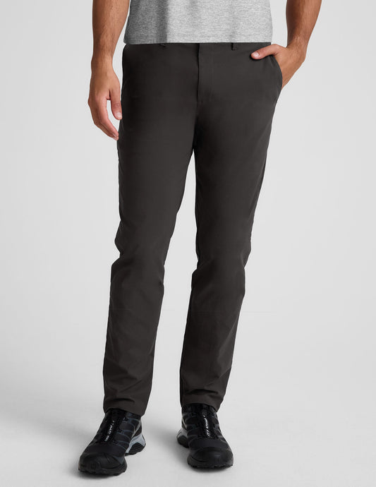 Essential Men's Chino 30" Trouser in black, showing a slim-fit, straight-leg cut with belt loops and button closure.