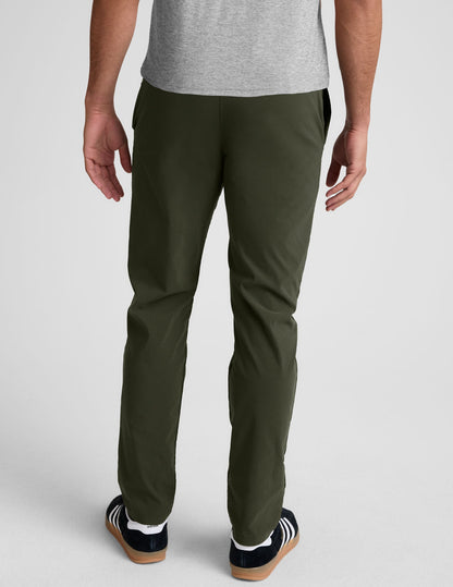 Rear view of dark green Essential Men's Chino 30" Trouser featuring back welt pockets, belt loops and a straight leg fit.