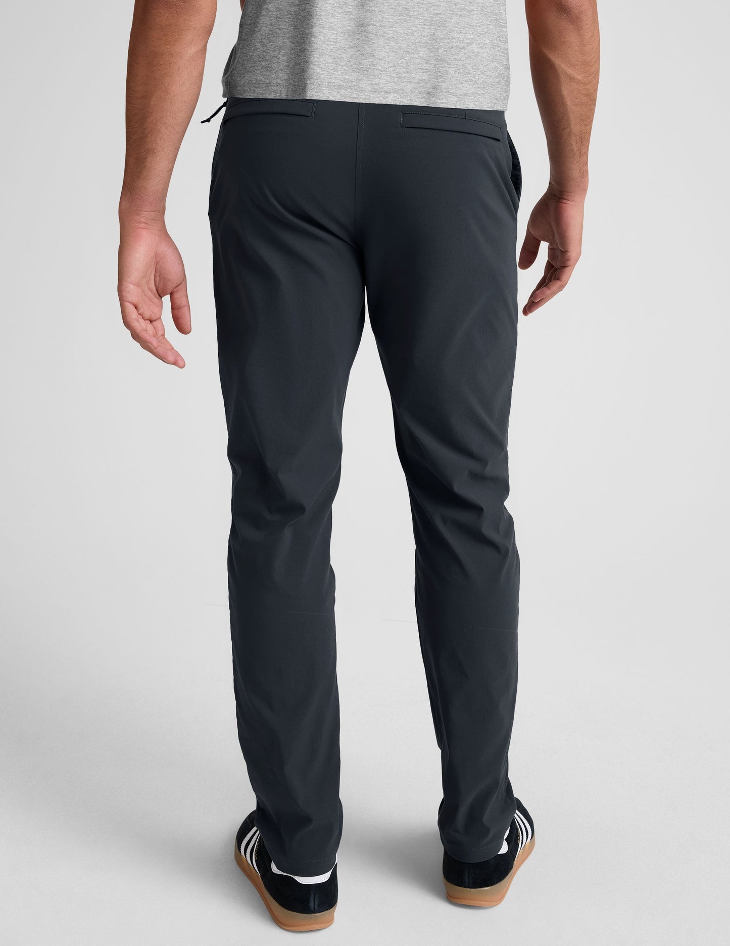 Back view of Essential Men's Chino 32" Trouser in dark gray, featuring a straight leg fit, belt loops, and welt pockets.
