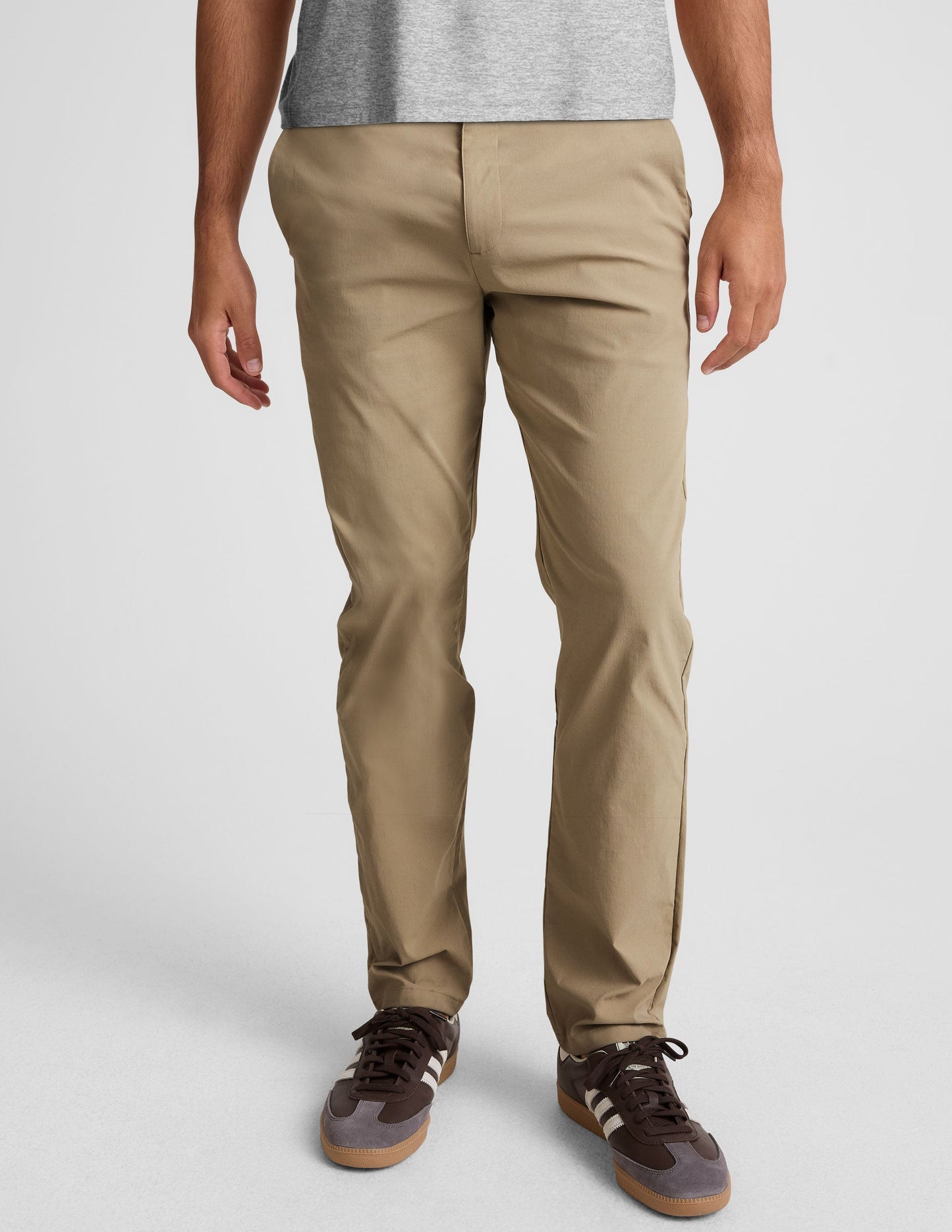 Front view of the beige Essential Men's Chino 32" Trouser, a straight-leg pant with belt loops and a button closure.