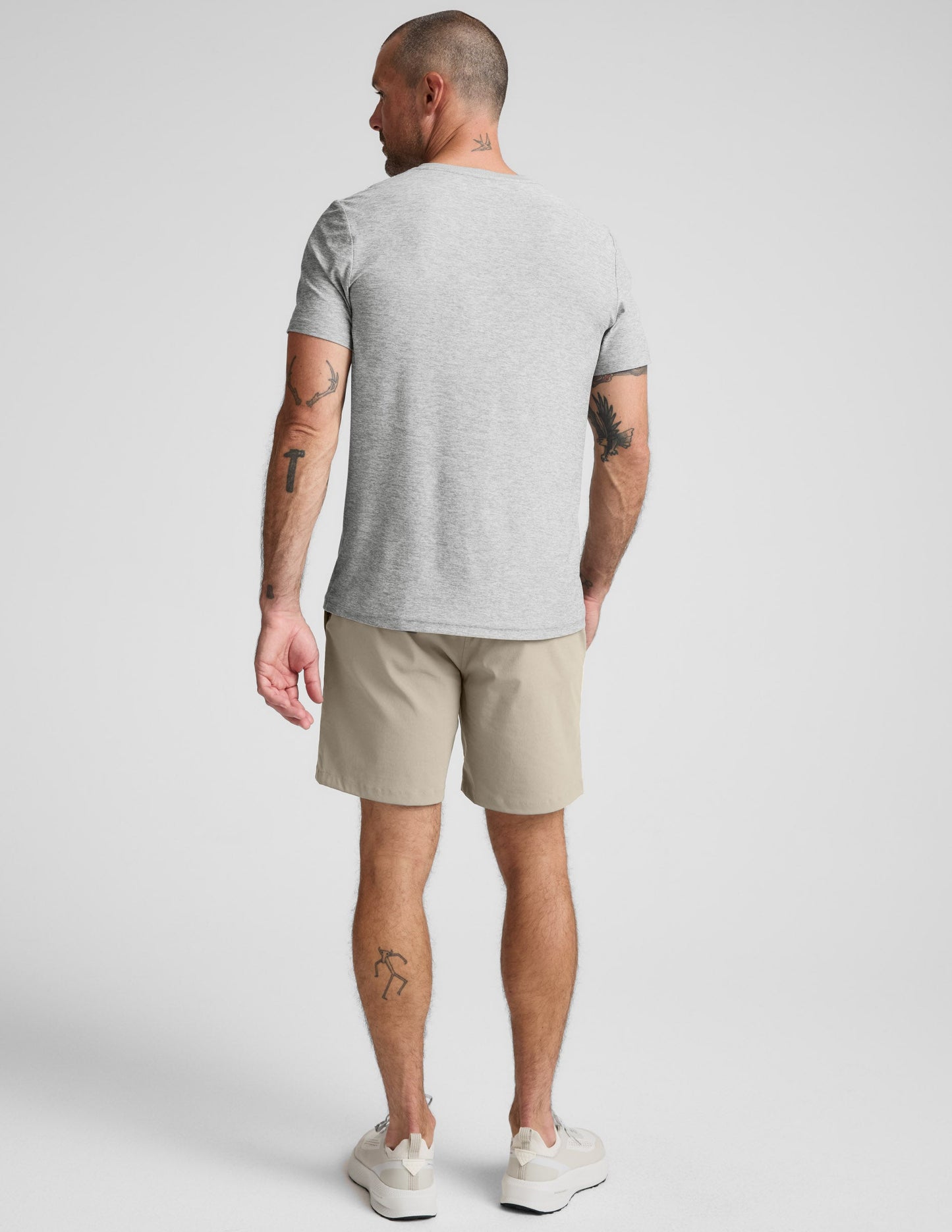 Back view of beige Element Men's Chino Short 7 inch with a mid-thigh straight leg silhouette and regular fit.