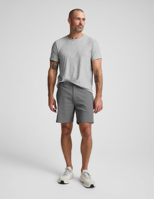 Gray Element Men's Chino Short 7" featuring a tailored fit, mid-thigh length, and side pockets on a standing model.