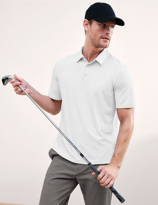 Man wearing a white polo shirt and gray pants on a plain background.