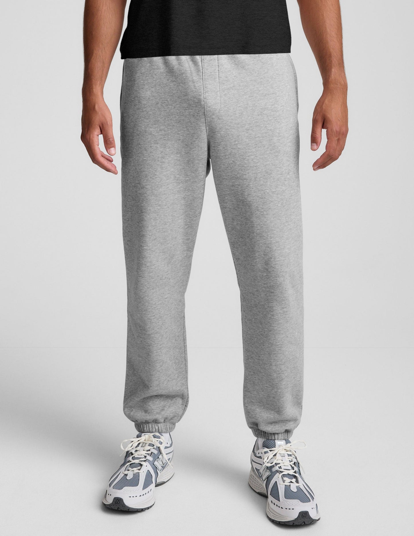 Light grey marled Classic Fleece Men's Jogger featuring a relaxed fit, elastic waistband, and gathered ankle cuffs.