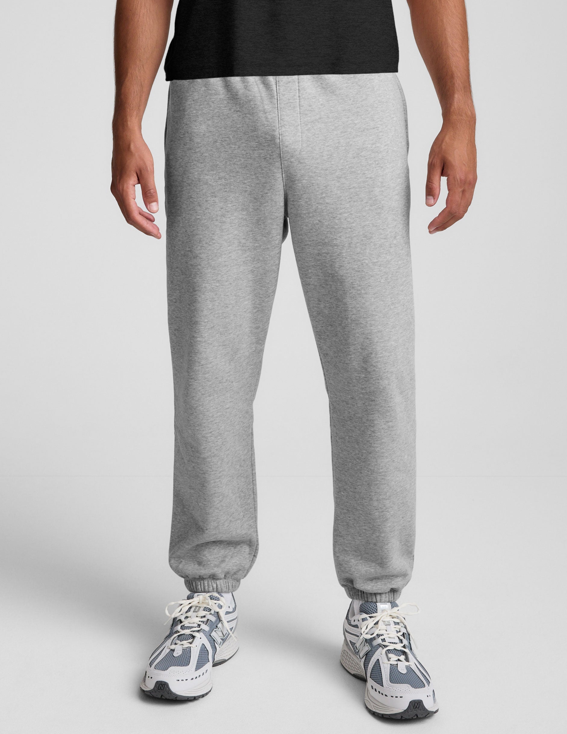 Light grey marled Classic Fleece Men's Jogger featuring a relaxed fit, elastic waistband, and gathered ankle cuffs.