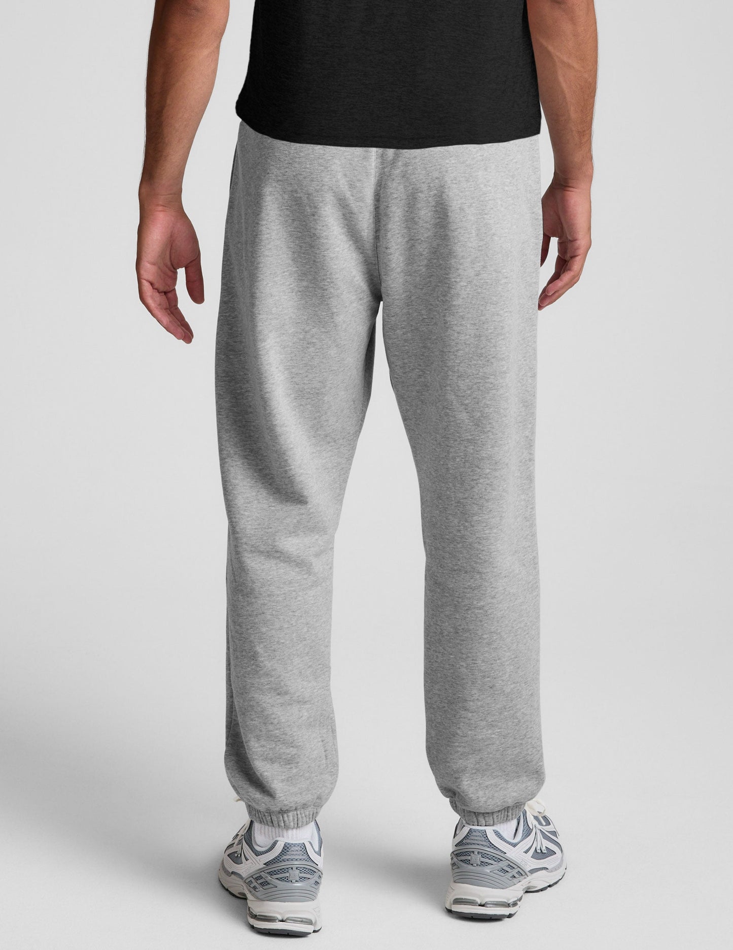 Rear view of light gray Classic Fleece Men's Jogger showing the relaxed fit, marled fabric, and elasticated cuffs.