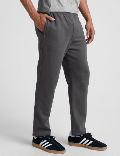 Gray LuxeFleece Men's Straight Leg Pant with a relaxed fit, zippered pockets, and elastic waistband shown on a model.