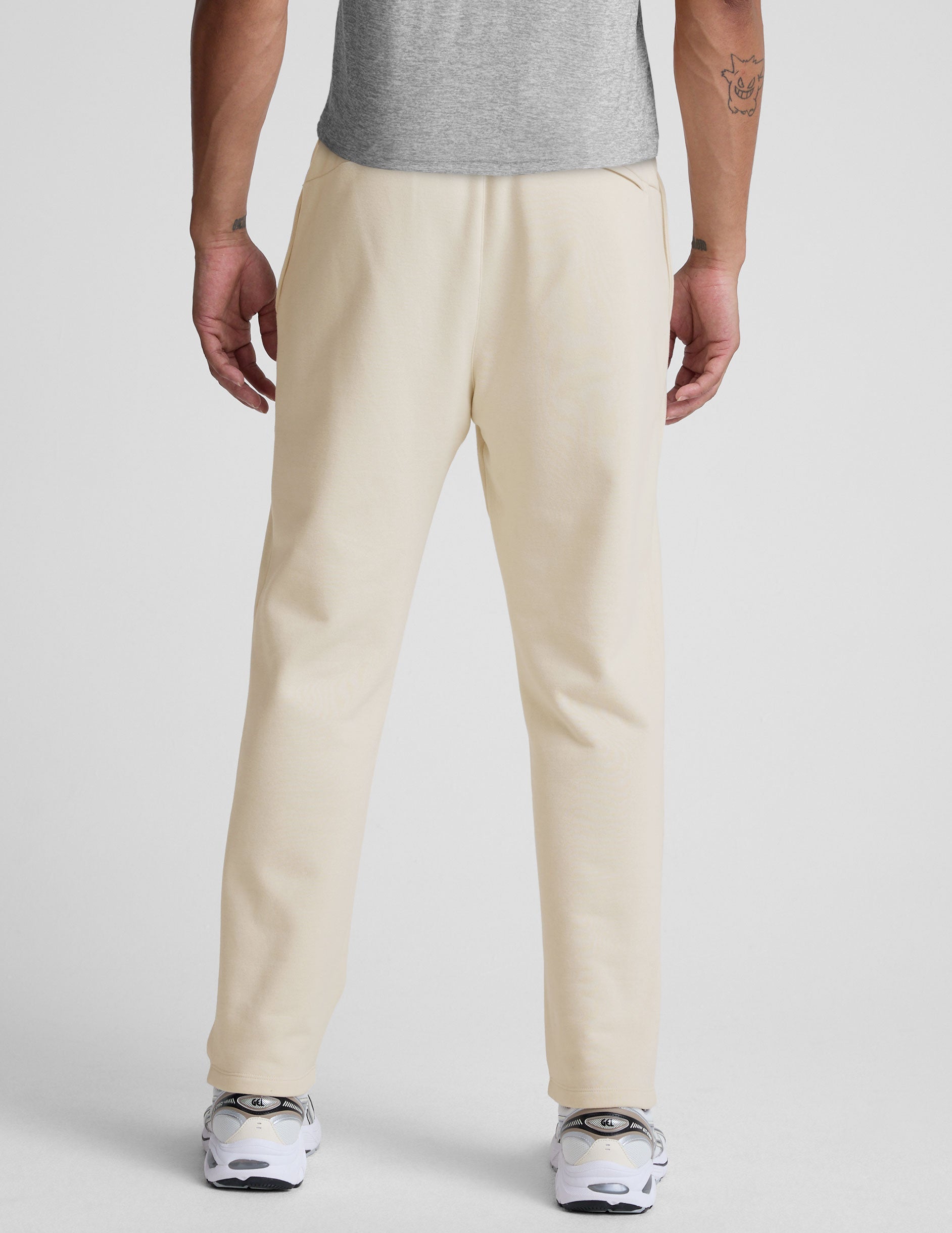Rear view of cream LuxeFleece Men's Straight Leg Pant featuring a relaxed fit, elastic waist, and straight-leg silhouette.