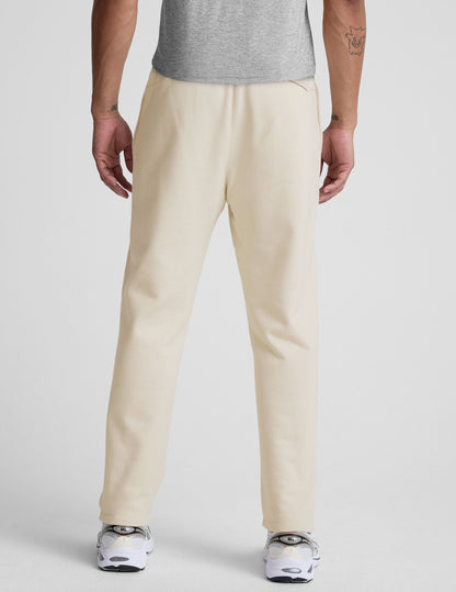 Rear view of cream LuxeFleece Men's Straight Leg Pant featuring a relaxed fit, elastic waist, and straight-leg silhouette.