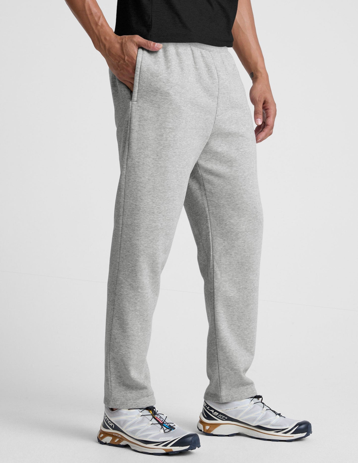 LuxeFleece Men's Straight Leg Pant in gray marled fleece. Model wears the relaxed fit, pull-on sweatpants with side pockets.