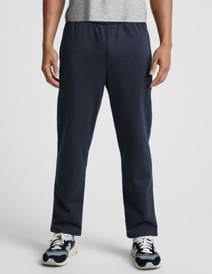 Navy LuxeFleece Men's Straight Leg Pant with a relaxed fit and elastic waistband, shown from the waist down on a model.