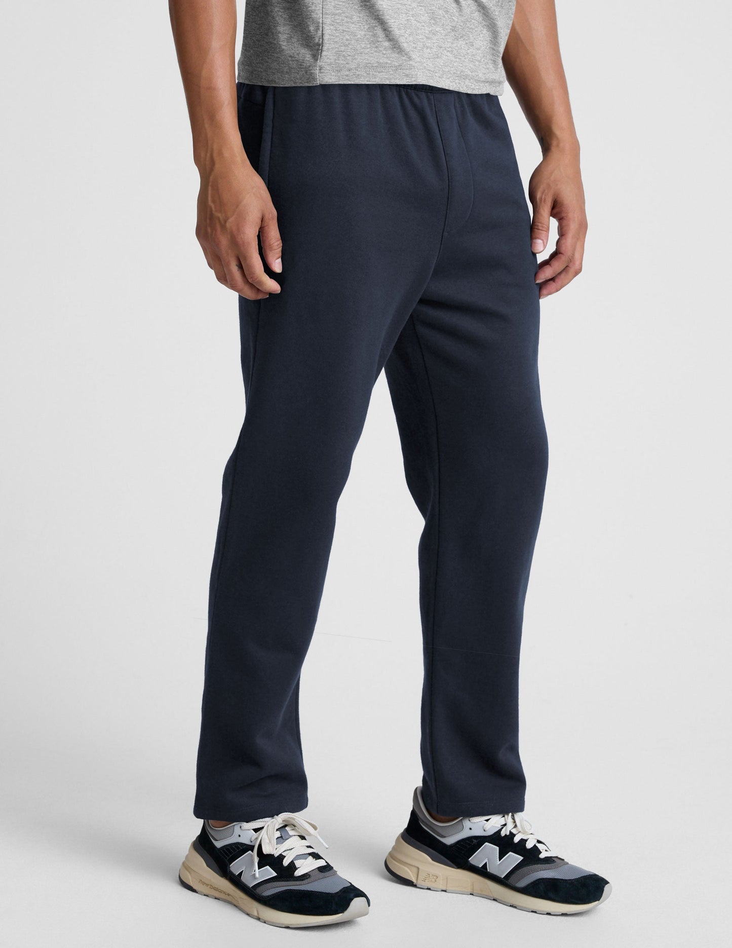 LuxeFleece Men's Straight Leg Pant in navy blue, featuring a relaxed fit, elastic waistband, and side zipper pockets.