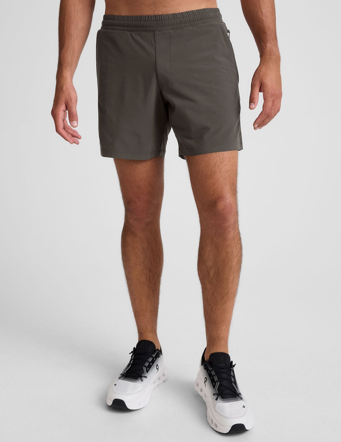 Front view of gray Pivotal 2.0 Men's Lined Short 7" with a gathered elastic waistband and relaxed fit on a model.