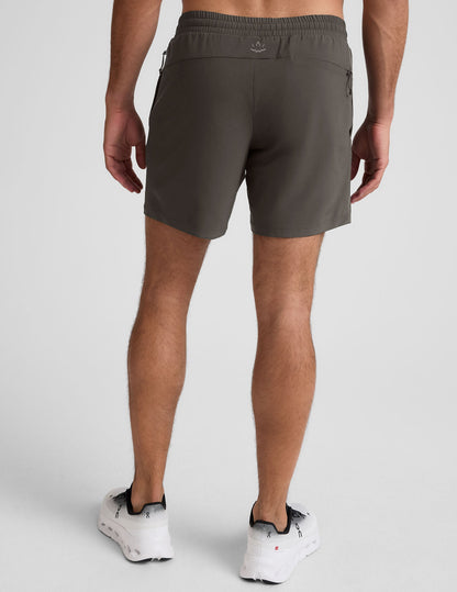 Rear view of dark gray Pivotal 2.0 Men's Lined Short 7" featuring an elastic waistband and relaxed straight silhouette.