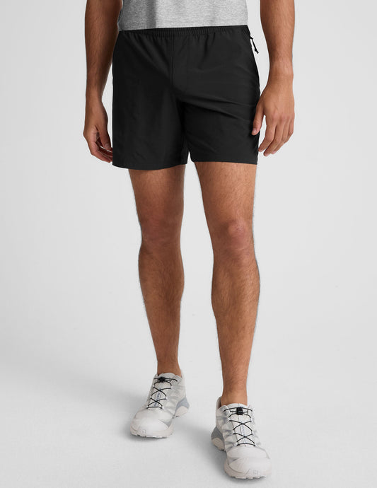 Front view of black Pivotal 2.0 Men's Short 7" on model with gathered elastic waistband and relaxed straight silhouette.