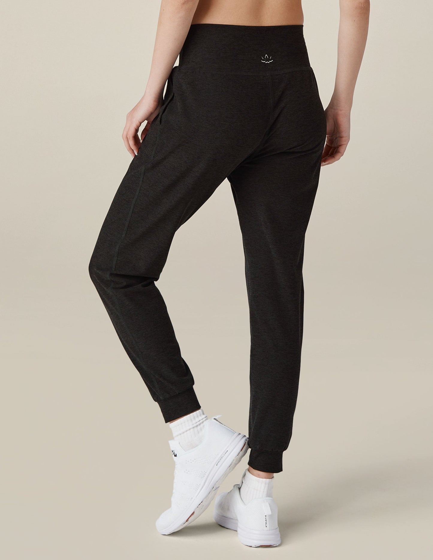 Rear view of Spacedye Midi Jogger in marled black featuring a wide waistband, slim tapered fit, and banded ankle cuffs.