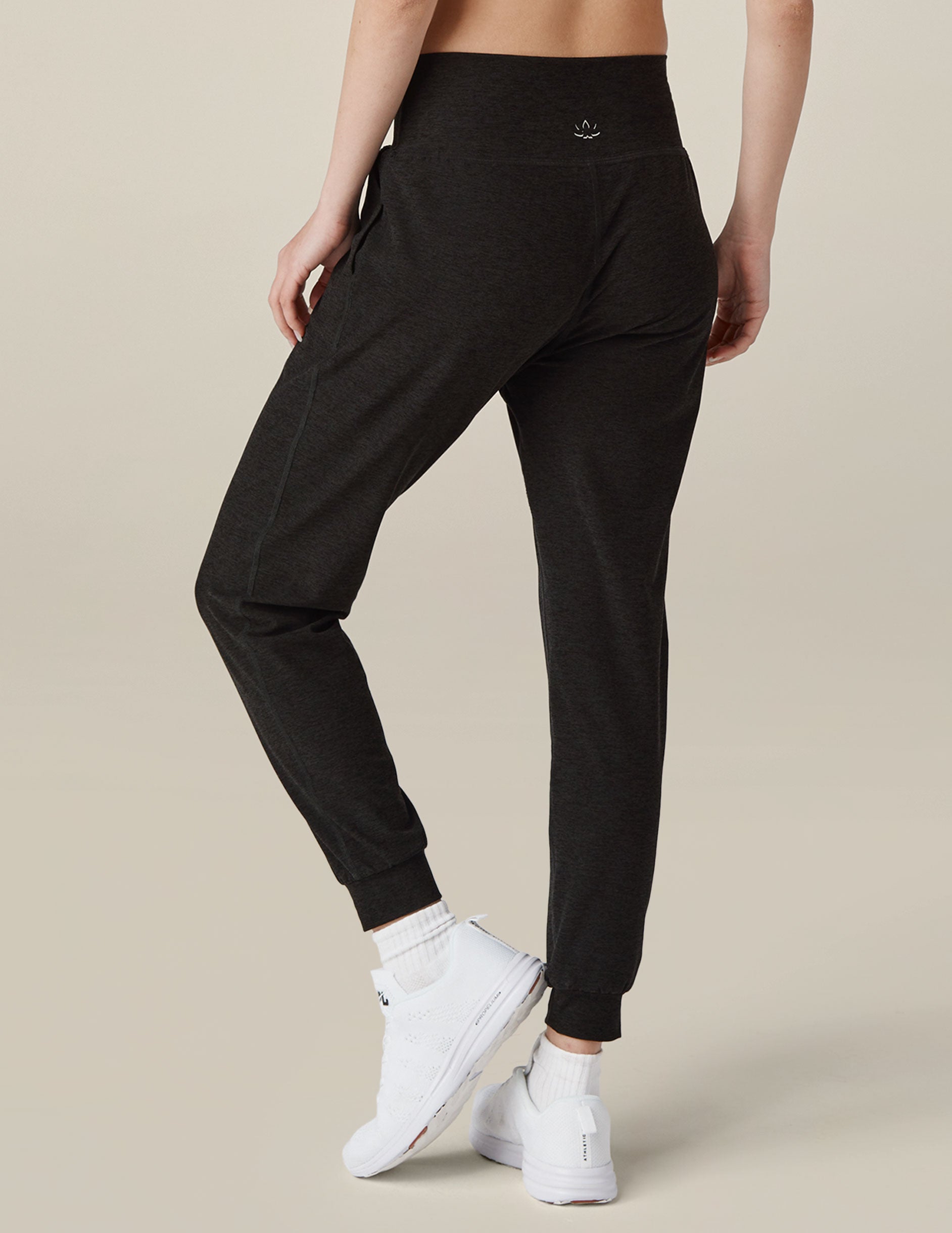 Rear view of Spacedye Midi Jogger in marled black featuring a wide waistband, slim tapered fit, and banded ankle cuffs.