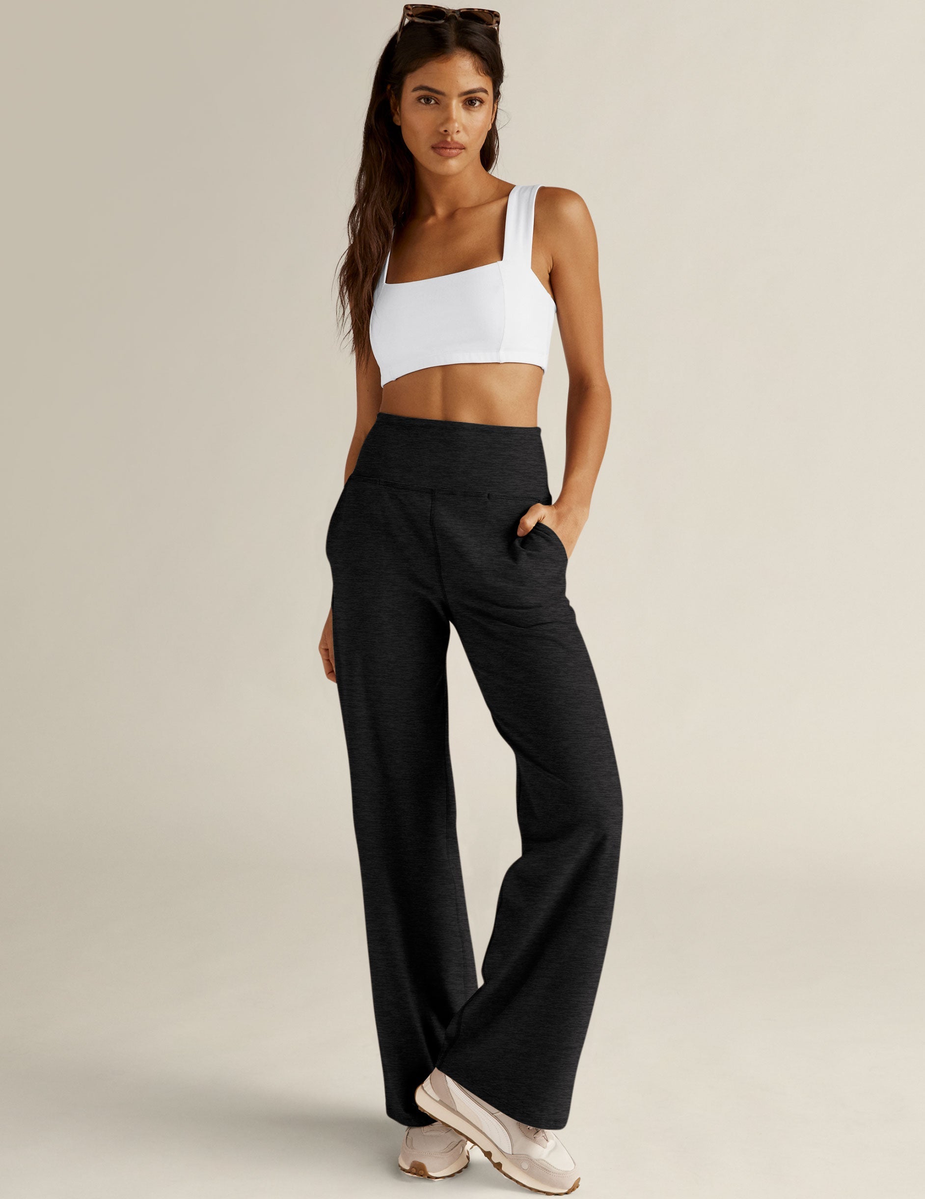 Model wearing black marled Spacedye Laid Back Pant with a high waistband, side pockets, and a wide-leg silhouette.