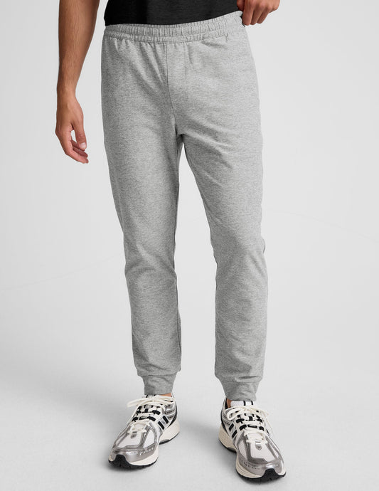 Slim-fit light gray marled Spacedye Freefit Men's Zipper Pockets Jogger with elastic waistband and banded cuffs.