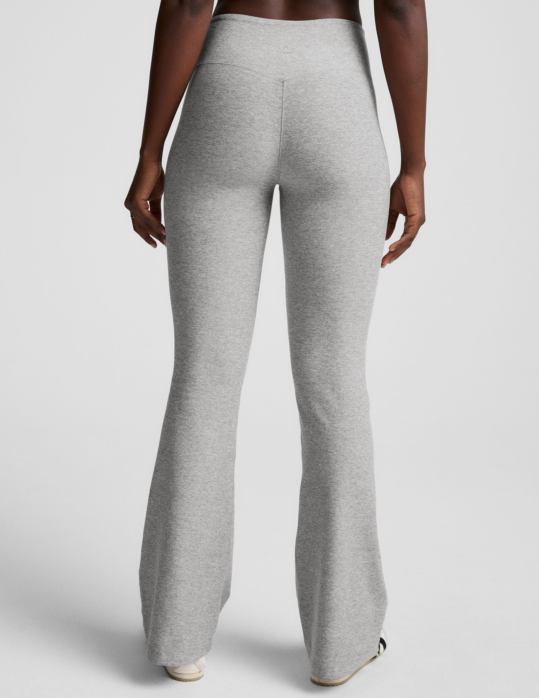 Rear view of gray marled Spacedye Mid-Rise Bootcut Pant featuring a snug fit through the leg and a flared bootcut hem.