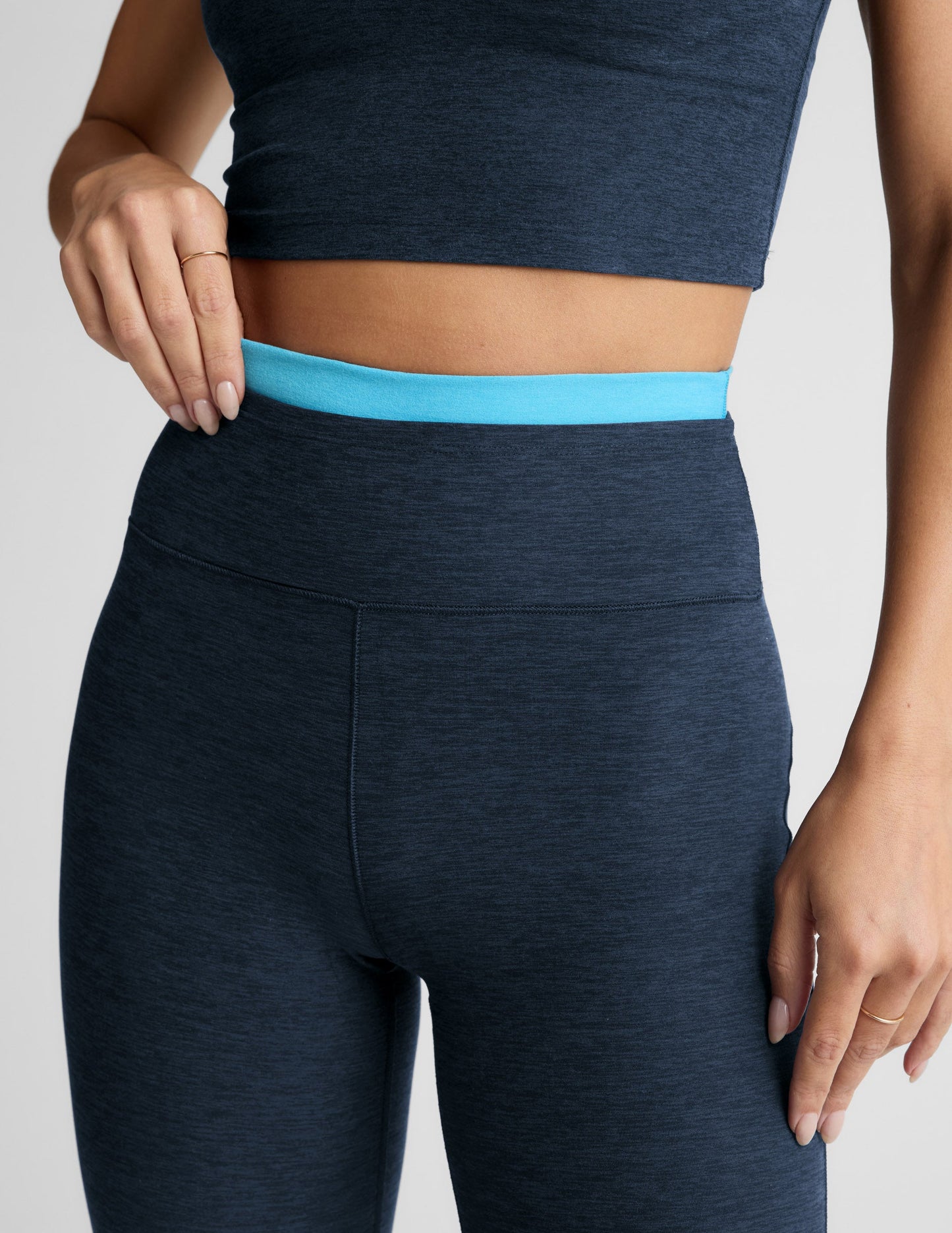 Navy Spacedye Layered Bootcut Pant with a bright blue contrast waistband and high-rise fit.