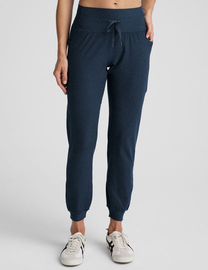 Navy Spacedye Go Pocket Jogger with a high drawstring waist, side pockets, and cuffed hems on a model.