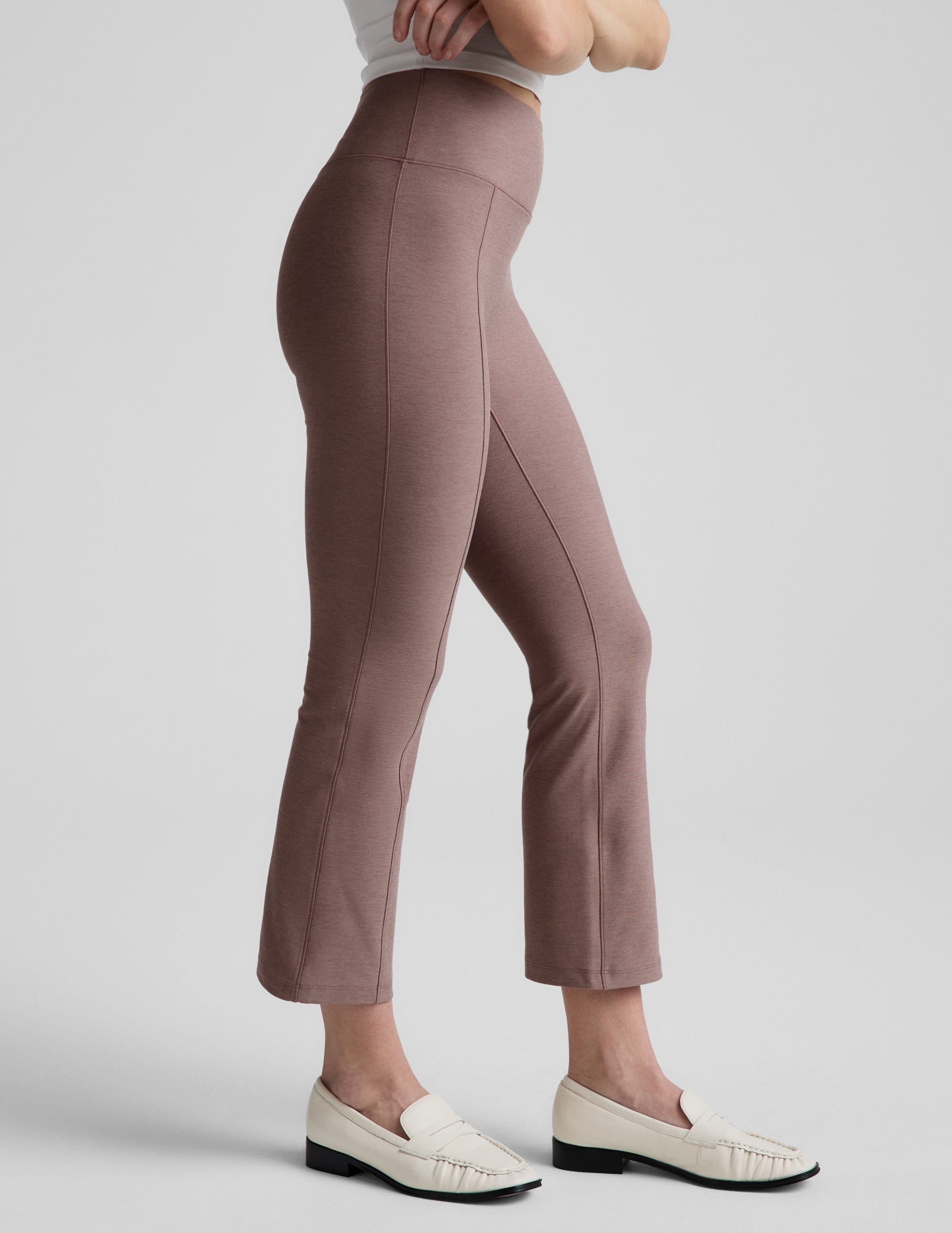 Side view of brown Spacedye Pintuck Kick Flare High Waisted Pant featuring a high rise, pintuck seams, and flared hem.