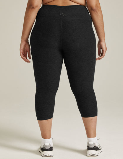 Back view of Spacedye Walk And Talk High Waisted Capri Legging in marled black with a high waistband and calf length.