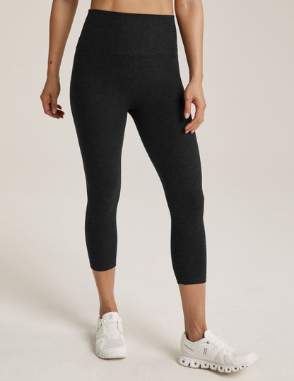 Spacedye Walk And Talk High Waisted Capri Legging in dark gray marled fabric with a wide waistband and low calf length.