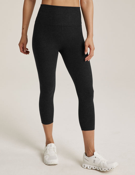 Spacedye Walk And Talk High Waisted Capri Legging in dark gray marled fabric with a wide waistband and low calf length.