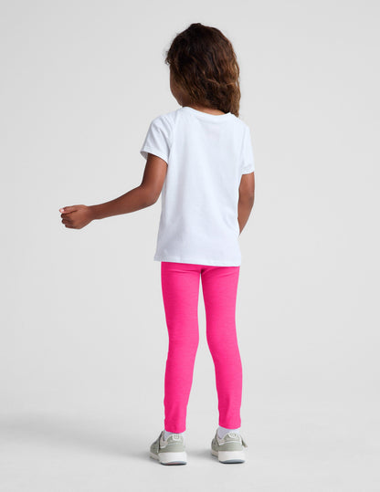 Back view of a girl wearing fuchsia Spacedye Toddler Leggings with a soft marled texture and snug, full-length fit.
