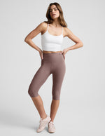 Brown Spacedye Pedal Pusher High Waisted Legging on a model, featuring a high rise and cropped length below the knee.