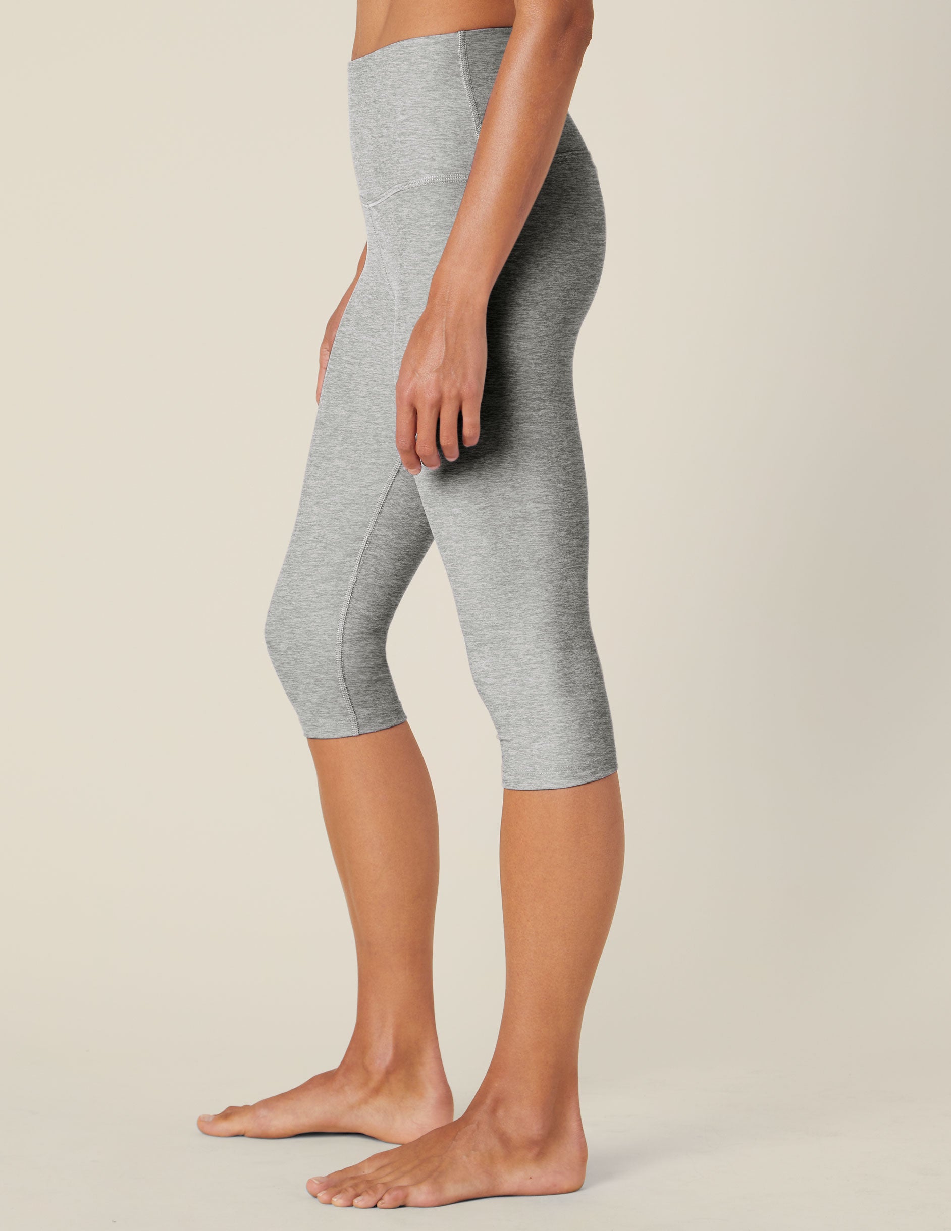 Side view of Spacedye Pedal Pusher High Waisted Legging in marled Silver Mist gray, hitting just below the knee.