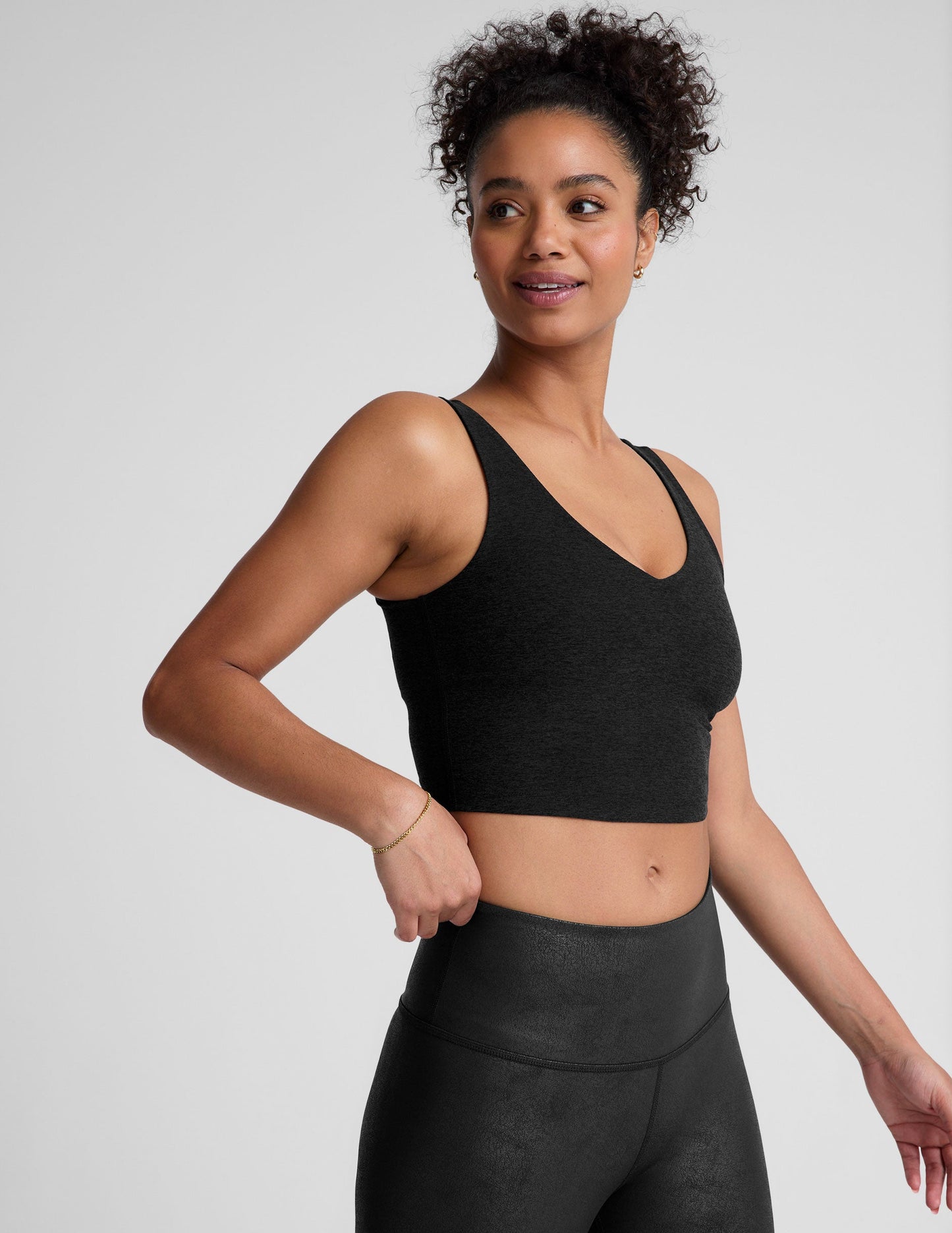 black v-neck cropped tank top.