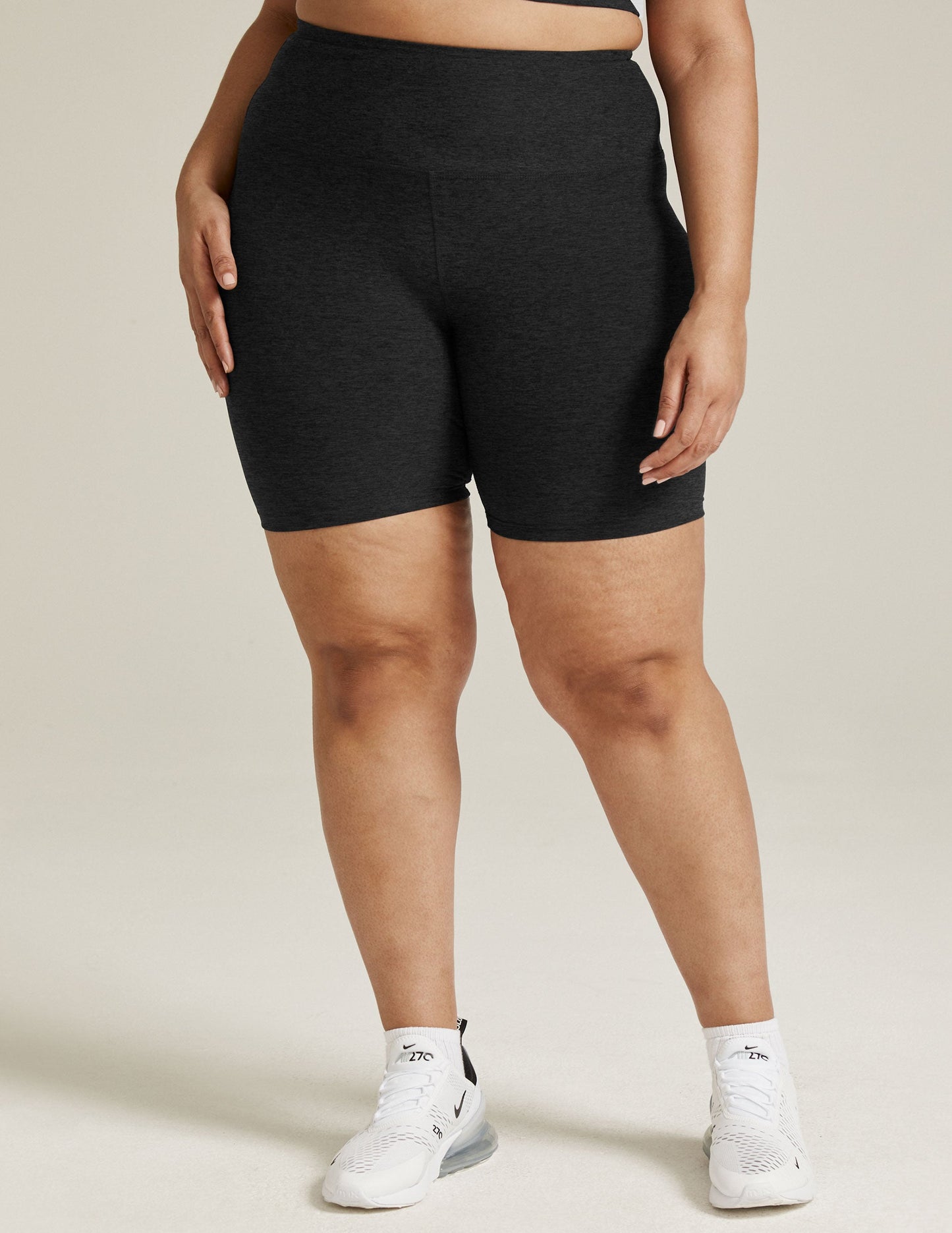 Front view of the Spacedye High Waisted 7" Biker Short in marled black, featuring a high-rise fit and mid-thigh length.