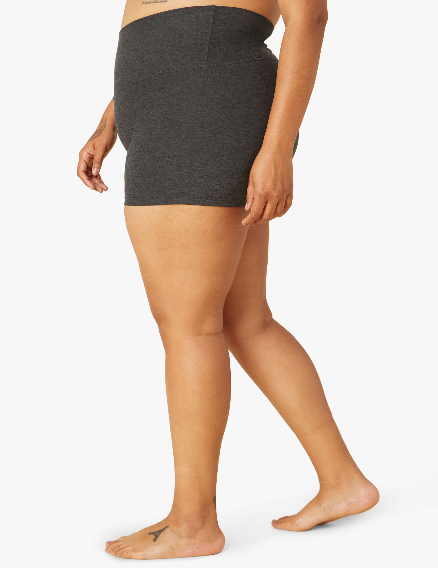Side profile of Spacedye All For Run 3" Short in dark gray marled fabric with a high waistband and compressive fit.