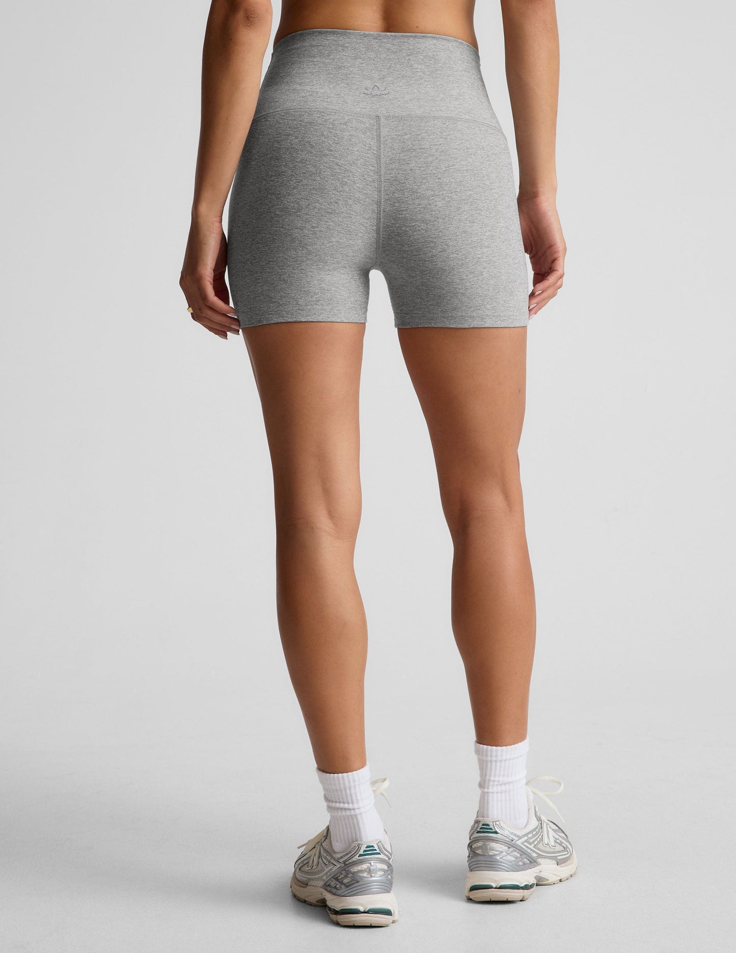 gray high-waisted 3" inseam biker shorts.